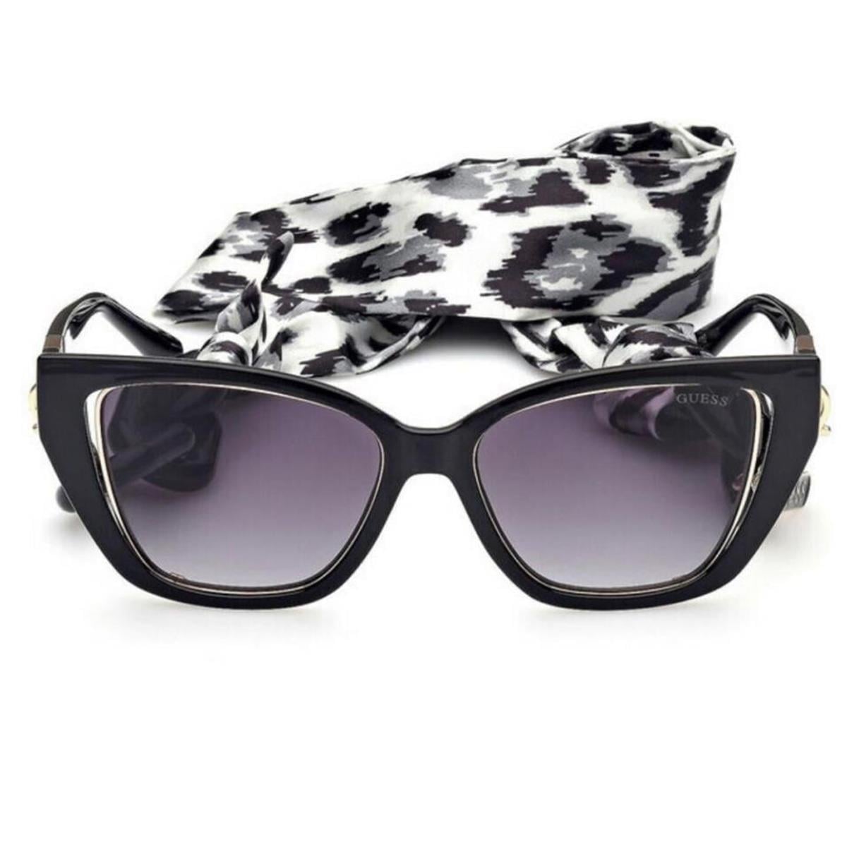 Angled view of Guess GU7816 01B black sunglasses with scarf