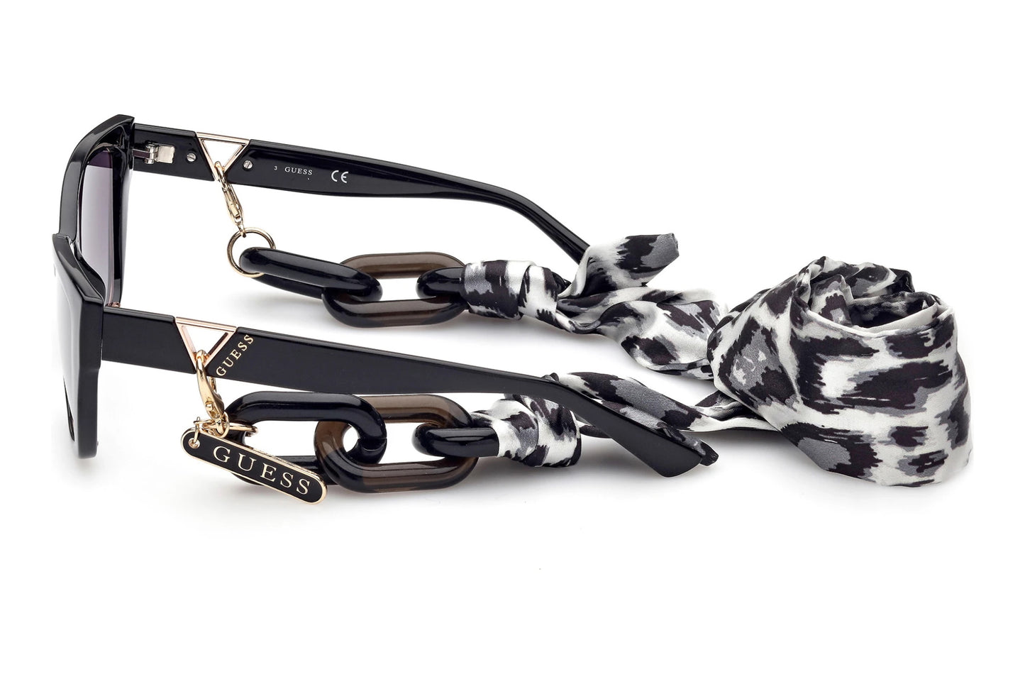 Fashion model wearing Guess GU7816 01B black sunglasses with scarf